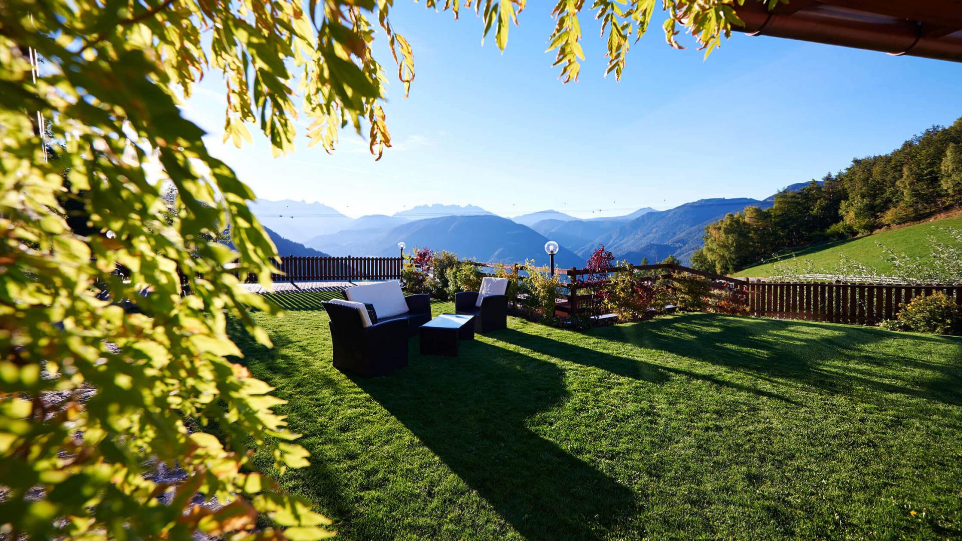 Alpine Lodge Rental in the Dolomites with Wonderful Mountain Scenery a big garden and alpine wellness and spa